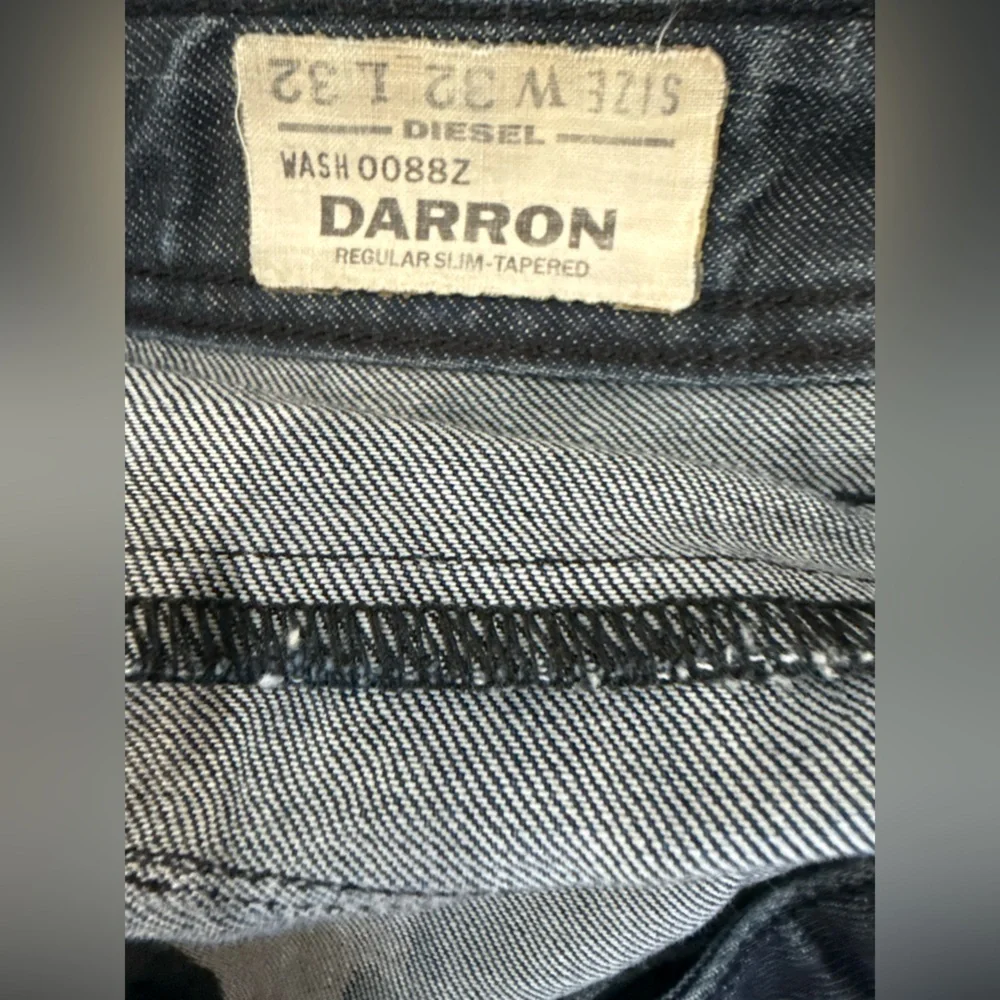 Diesel Jeans in Dark Blue Denim with Silver Button